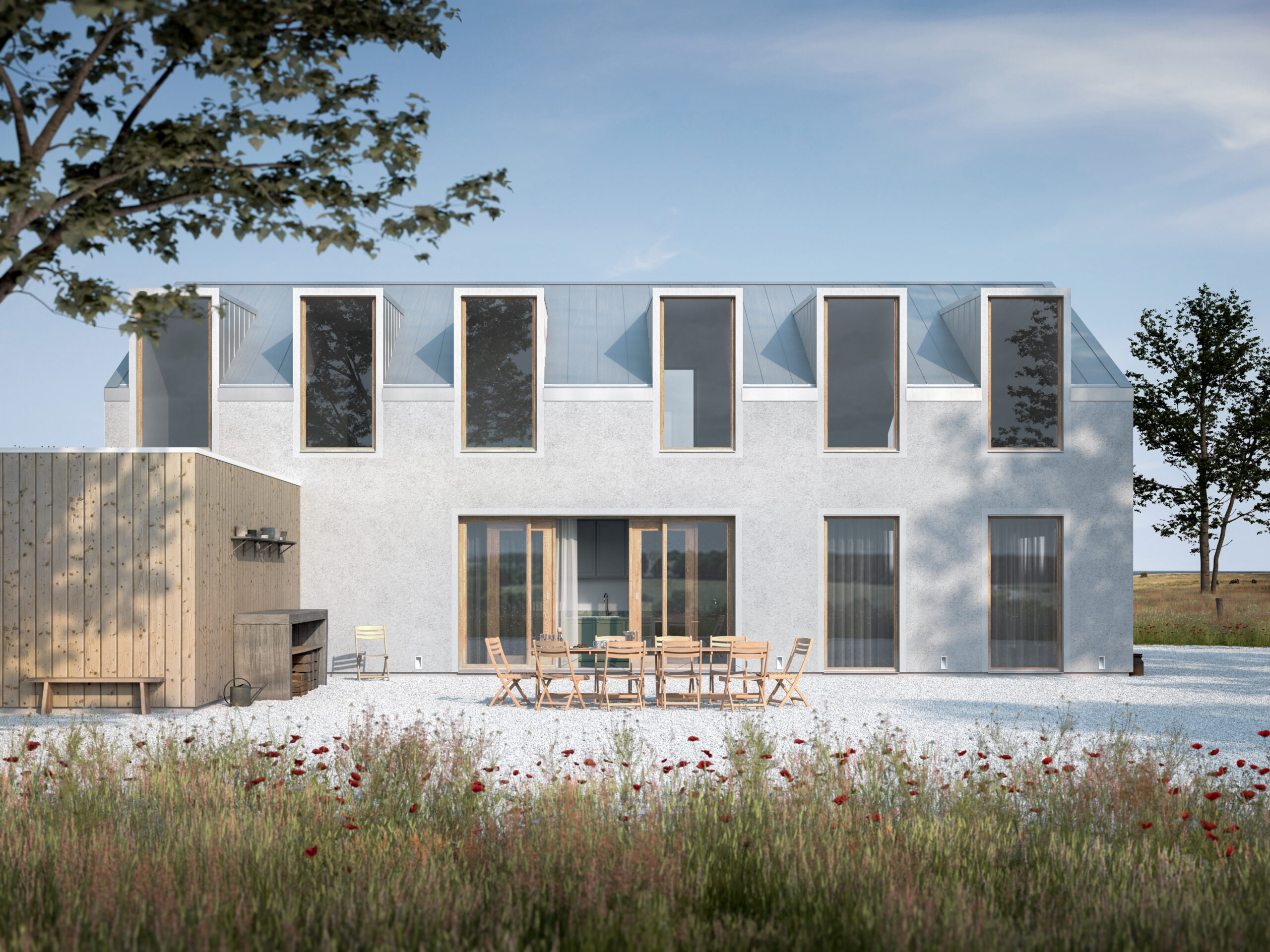 Arkitektritad villa. Putsad fasad, zinkplåt på taket och varma träfönster
